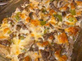 Philly Cheese Steak Casserole with beef, peppers, onions, and melted provolone