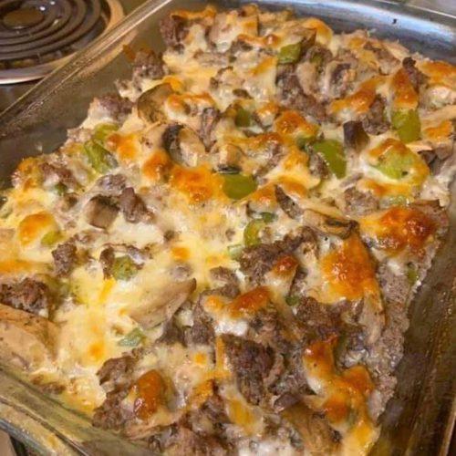 Philly Cheese Steak Casserole with beef, peppers, onions, and melted provolone