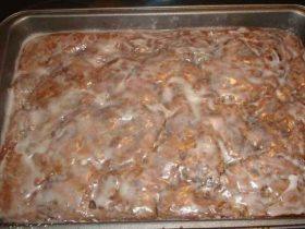 Apple fritter cake with cinnamon apples and vanilla glaze