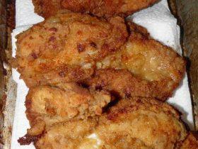 Crispy cornflake oven-fried chicken breasts with a golden baked coating