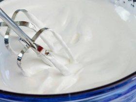 Fluffy glossy seven minute frosting with soft white peaks