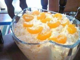 Creamy mandarin orange salad with pineapple, vanilla pudding, and whipped topping