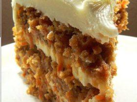 Carrot cake with pineapple, raisins, walnuts, and cinnamon baked in moist layers