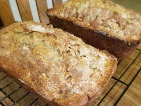Apple pie bread with cake mix, apple pie filling, fresh apple pieces, and cinnamon topping