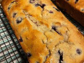 Lemon blueberry bread with juicy blueberries and a sweet lemon glaze