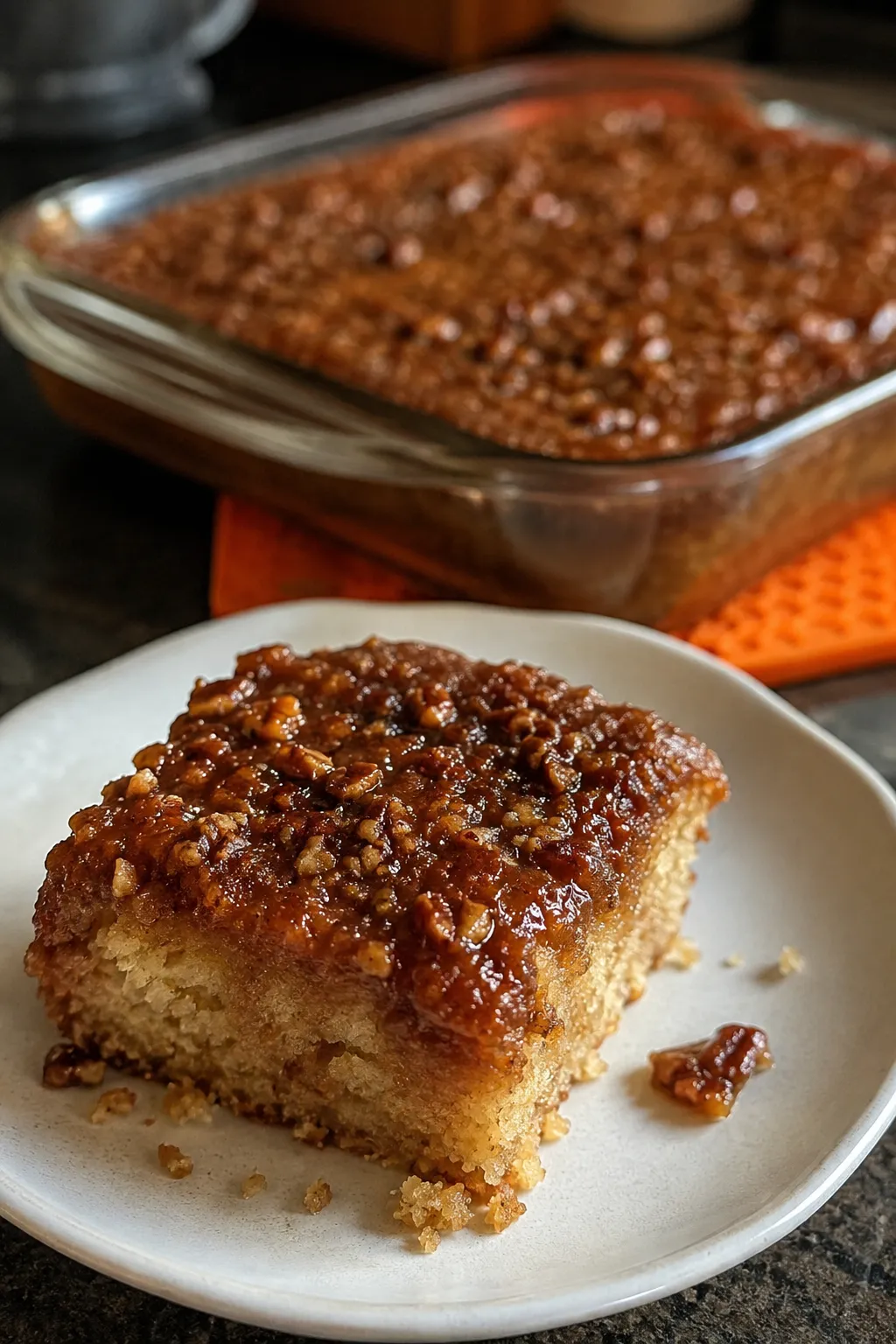 Homemade Granny Cake with pineapple, brown sugar, pecans, and buttery glaze