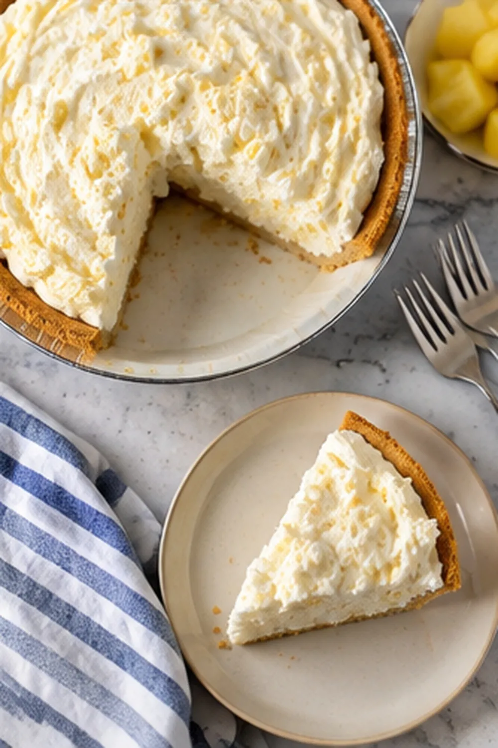Slice of 3-Ingredient Pineapple Fluff Pie ready to serve