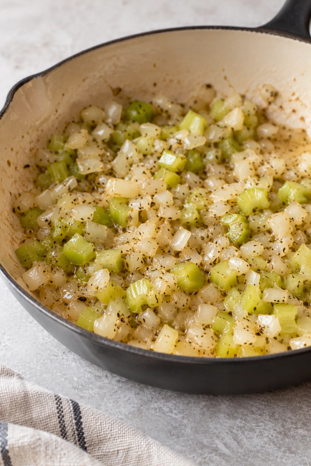 Diced onion and celery sauteed in butter with herbs for stuffing balls