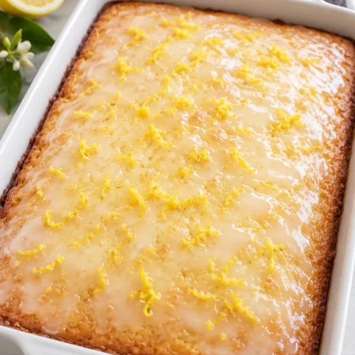 Whole Lemon Cake To Die For with glossy lemon glaze and fresh lemon zest
