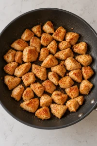 Diced garlic and paprika chicken cooked in a large nonstick skillet