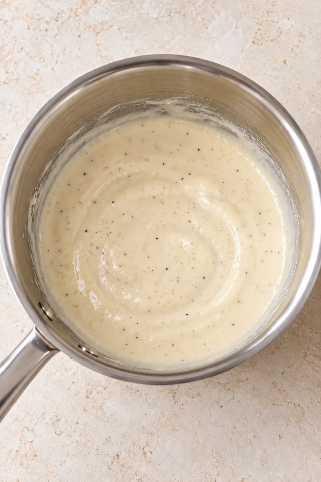 Smooth creamy milk and ranch sauce in a small saucepan before adding it to the chicken