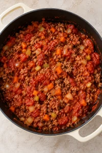 Beef and diced vegetables stirred with diced tomatoes and tomato sauce.
