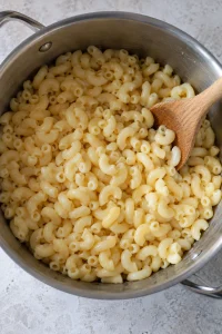 Cooked elbow macaroni tossed with butter