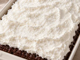 Whole Mounds cake with a white coconut whipped topping