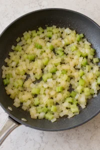 Diced onion and celery softened in butter in a plain skillet