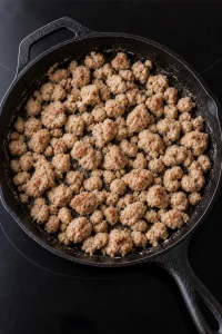 Breakfast sausage lightly coated with cooked flour before adding milk