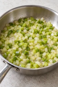 Diced onion, celery, and green pepper softened in melted butter